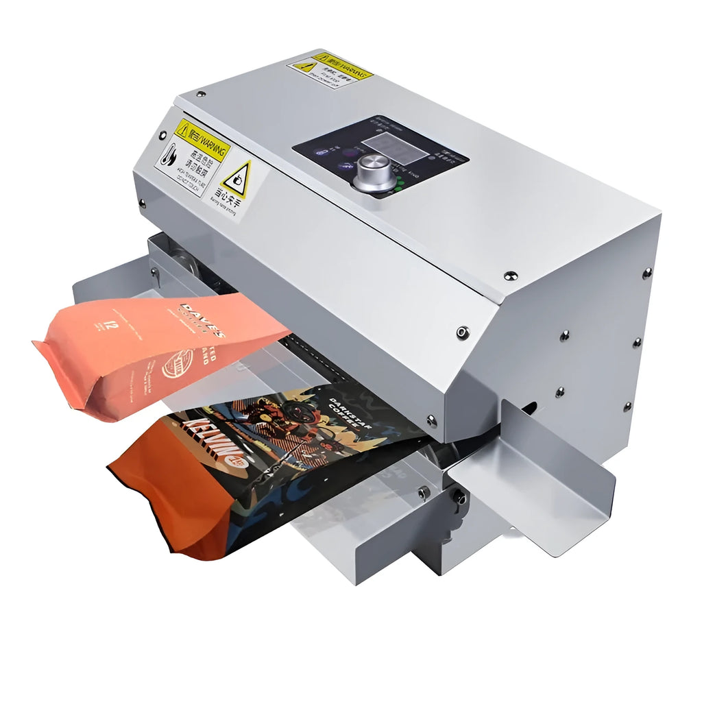Silver household portable aluminium foil bag sealing machine with three specification options on a kitchen counter