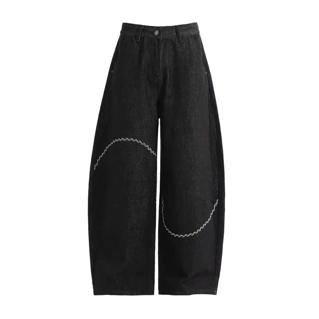 Black straight-leg polyester denim trousers with a zip fly and micro-elastic waistband.