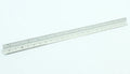 30cm silver metal architect technical triangle ruler on white background