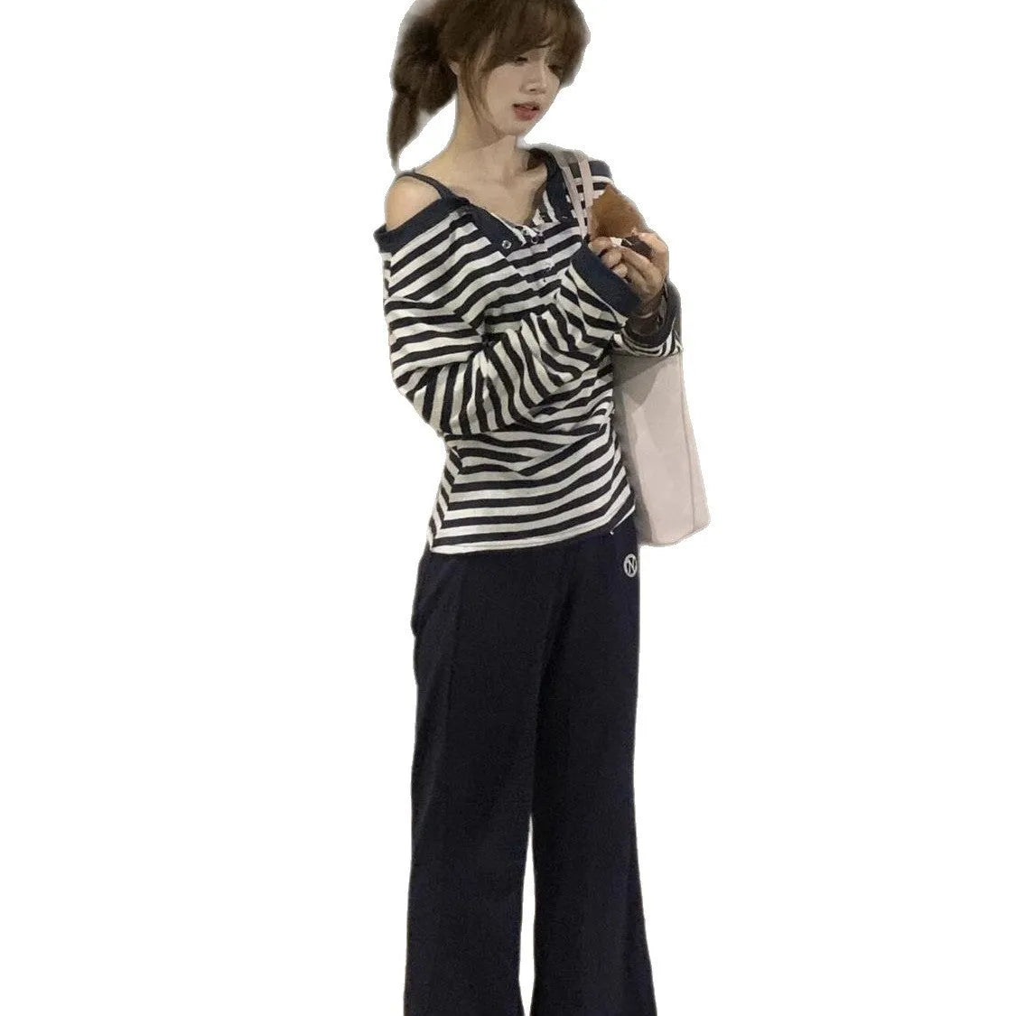 Dark blue Korean-style oversized women's t-shirt with long sleeves, stripes, and embroidery details.