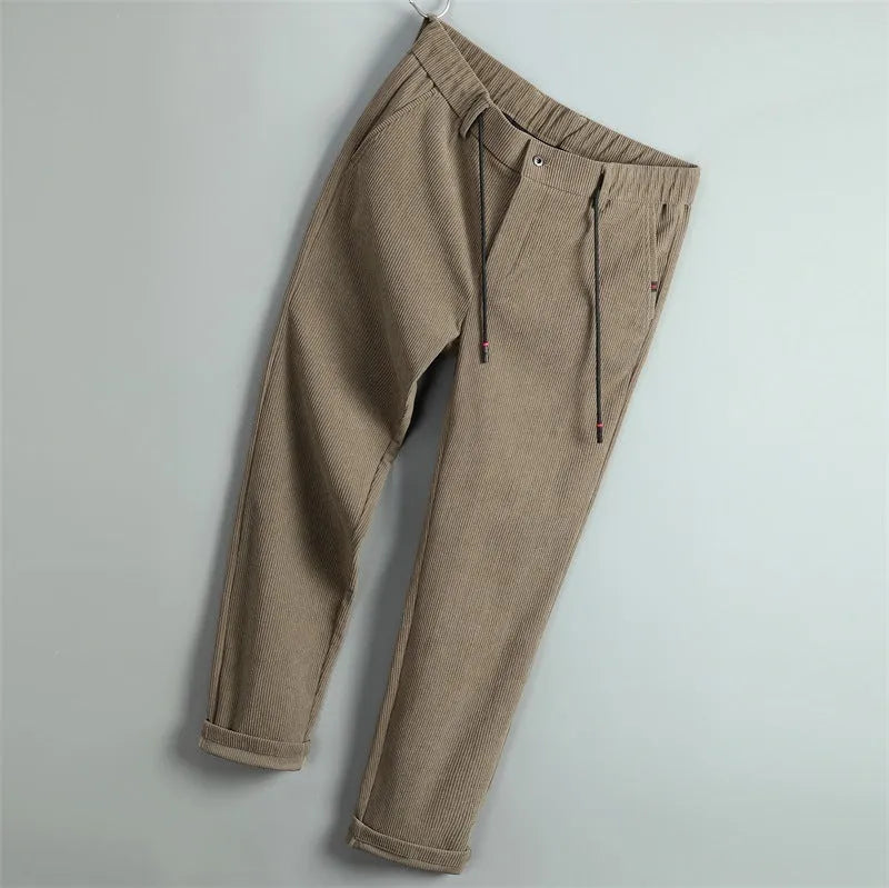 Men's casual striped polyester trousers in black, size 30, front view