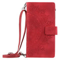 Multi-card embossed totem leather zipper bag phone case for iPhone 16 Pro in black, flip style with card slots