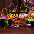 Halloween candy bag in pumpkin, witch, vampire, or blackcat design measuring 16cm square