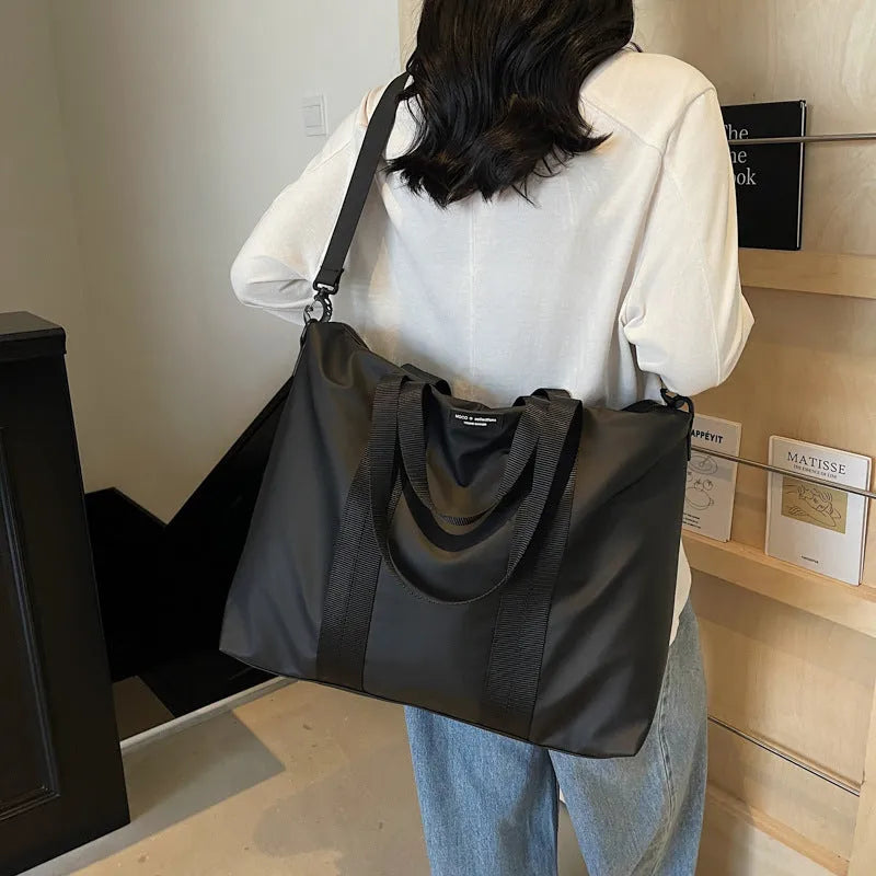 Lightweight Oxford cloth tote bag in black, grey or champagne with 20-35L capacity