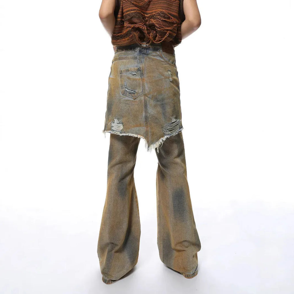 Women's loose hole bootcut jeans in picture colour with a high waist and button fly.