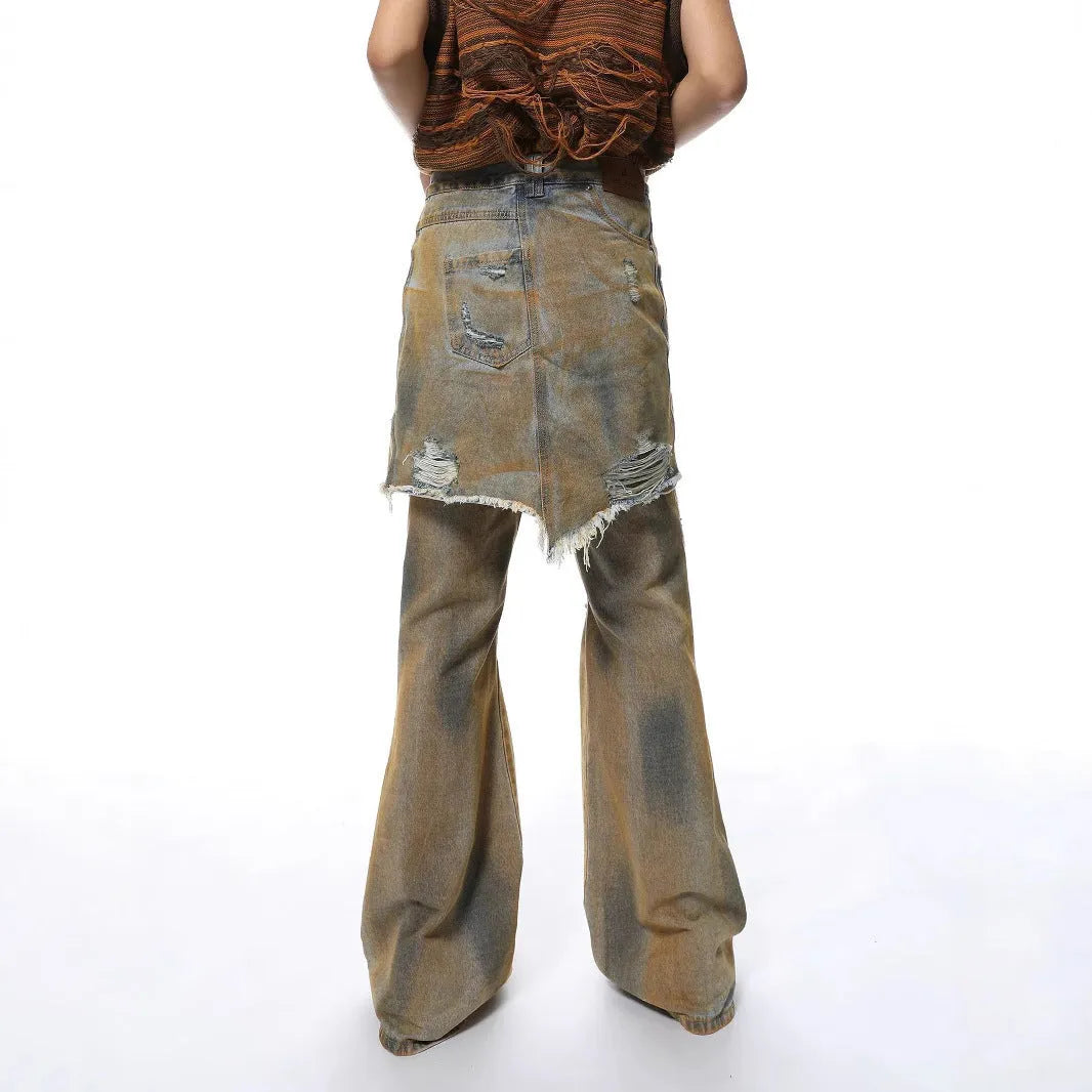 Women's loose hole bootcut jeans in picture colour with a high waist and button fly.
