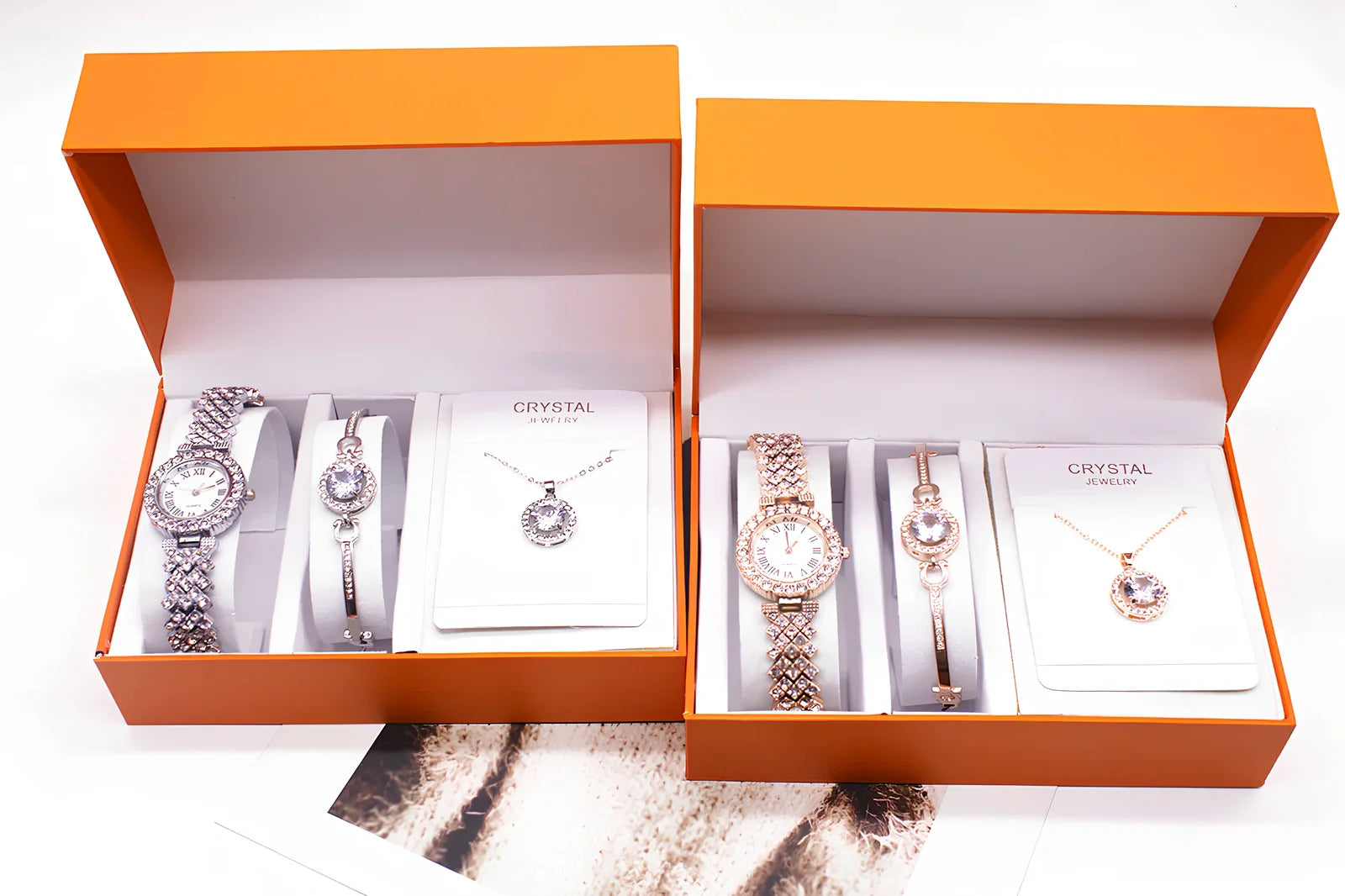 3-piece rhinestone quartz watch set with 22.5cm gold alloy strap, bracelet, and necklace on display