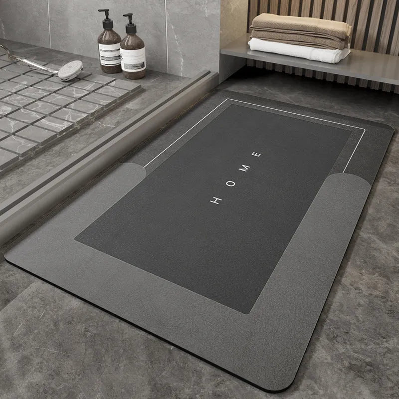 Cushioned bathroom floor mat in Lake Baikal blue colour, oval shape on tiled floor