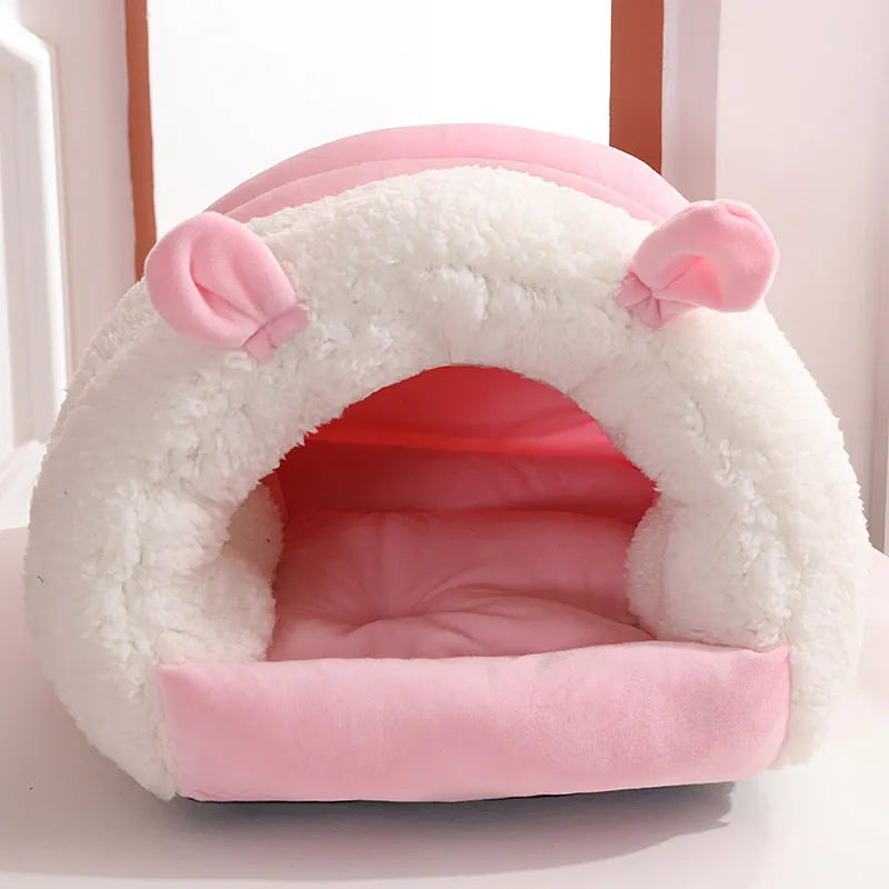 Closed round cat nest bed in blue, pink, or purple with soft plush interior and anti-skid bottom.