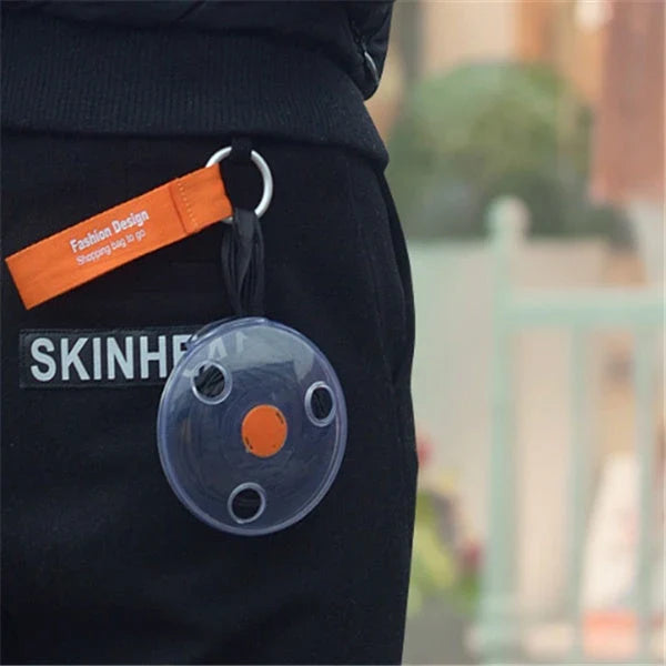 Disc folding portable shopping bag in vibrant colours, compact and eco-friendly