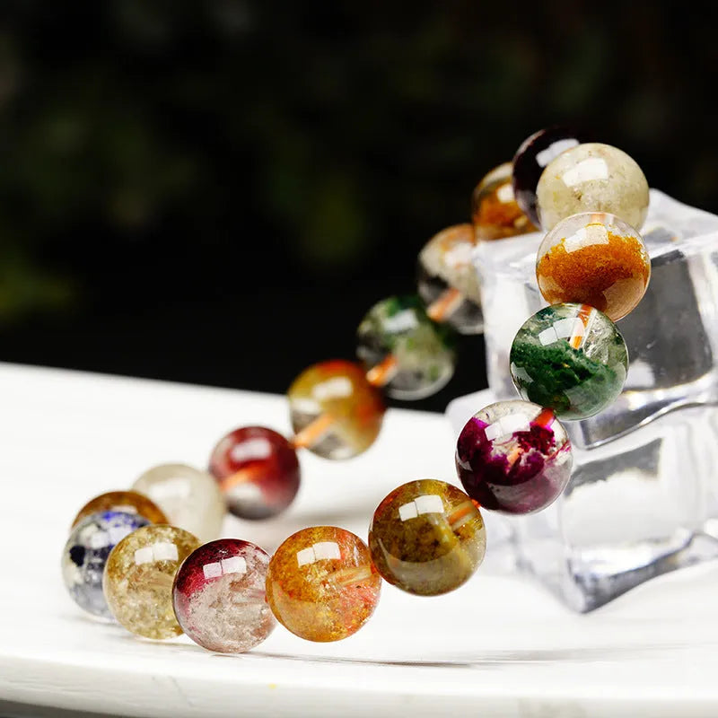 Ethnic style crystal ball bracelet with colourful ghost cornucopia design on 10mm beads.