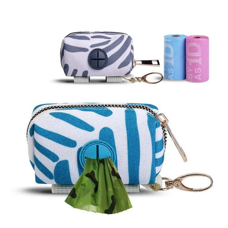 Compact polyester pet poop bag carrier with zipper closure and hand strap in forest bag print