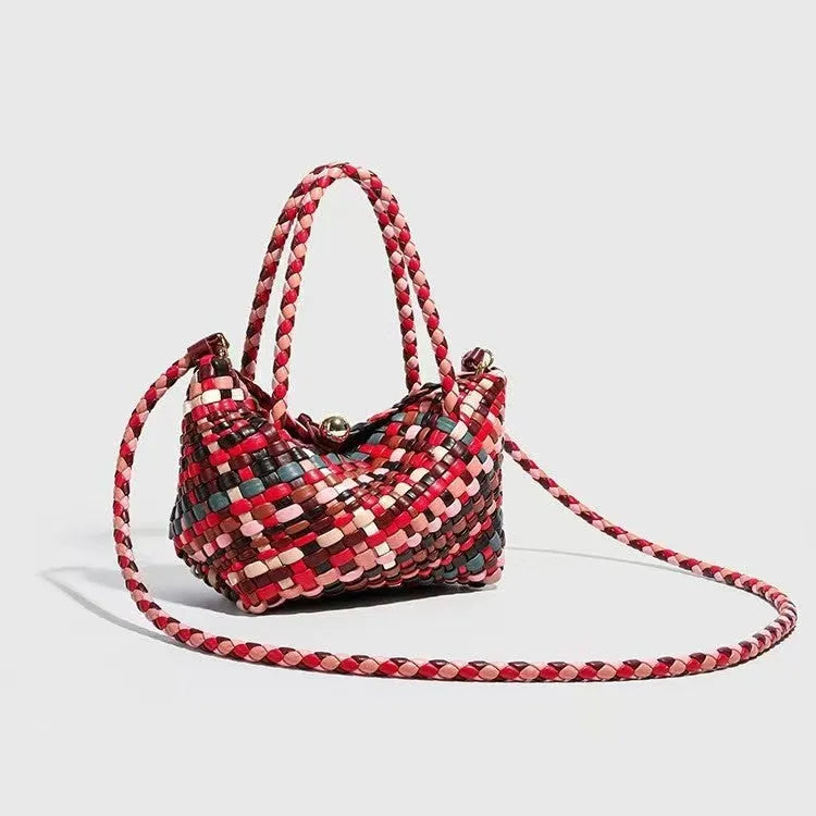 Women's woven PU leather shoulder bag showing handmade detailing and 18x11x14cm dimensions