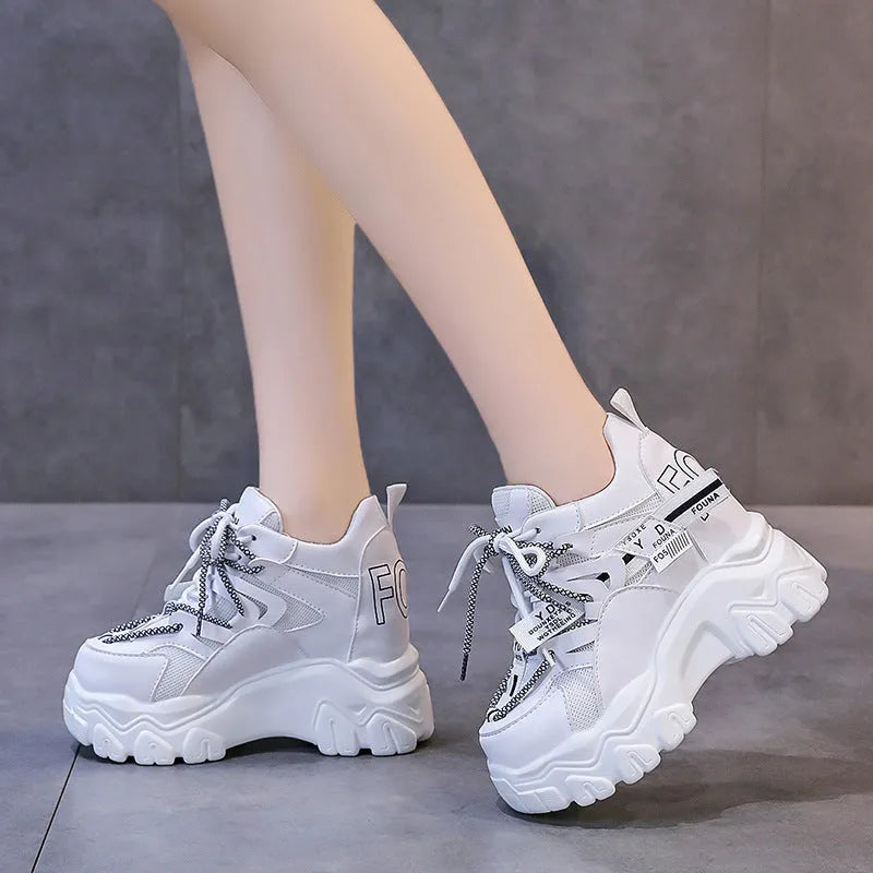 Women's white mesh platform shoes with cross strap and 6-8cm rubber sole heel.