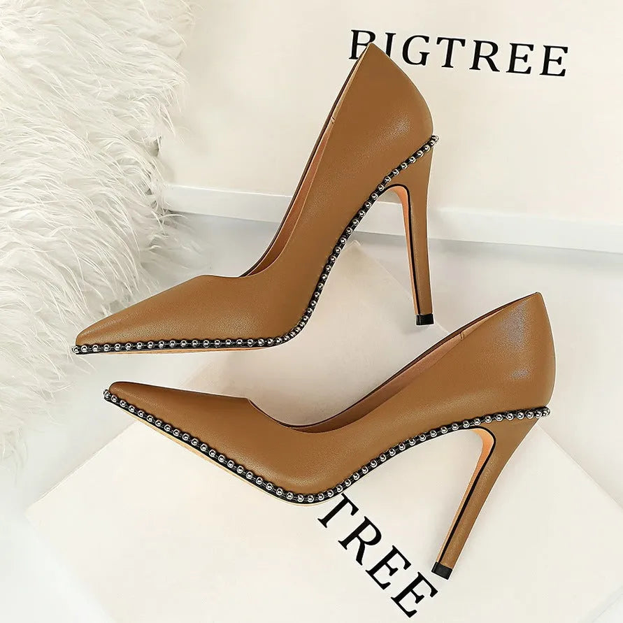 Studded high heels with rivet and metal chain detail, 10.5cm heel, black PU upper