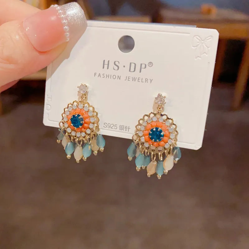 Purple and blue diamond embedded round crystal tassel earrings with thick gold plating
