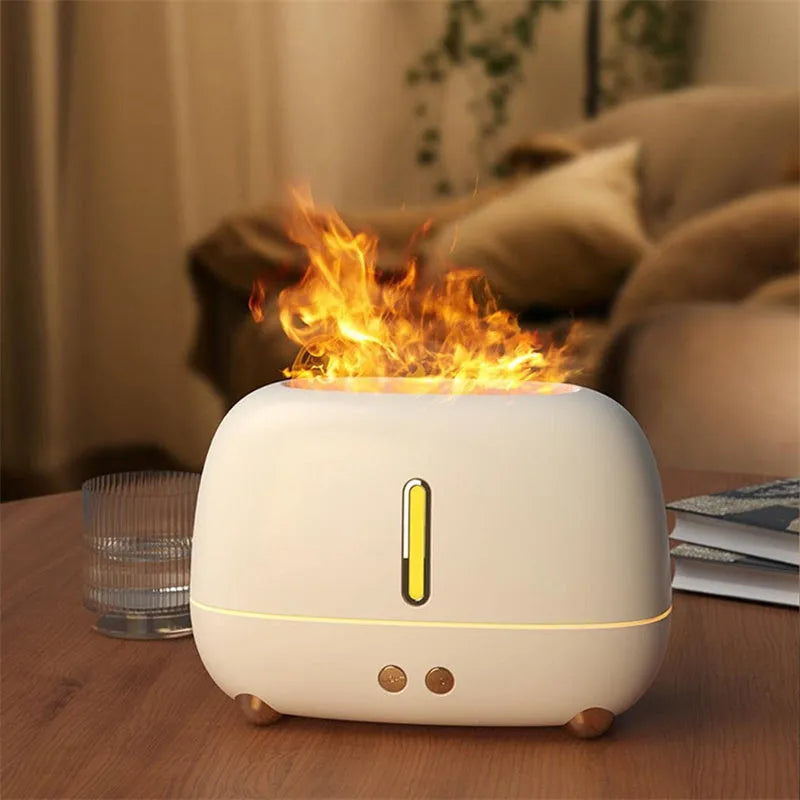 Dark grey flame humidifier with realistic orange LED light and mist output on a wooden table