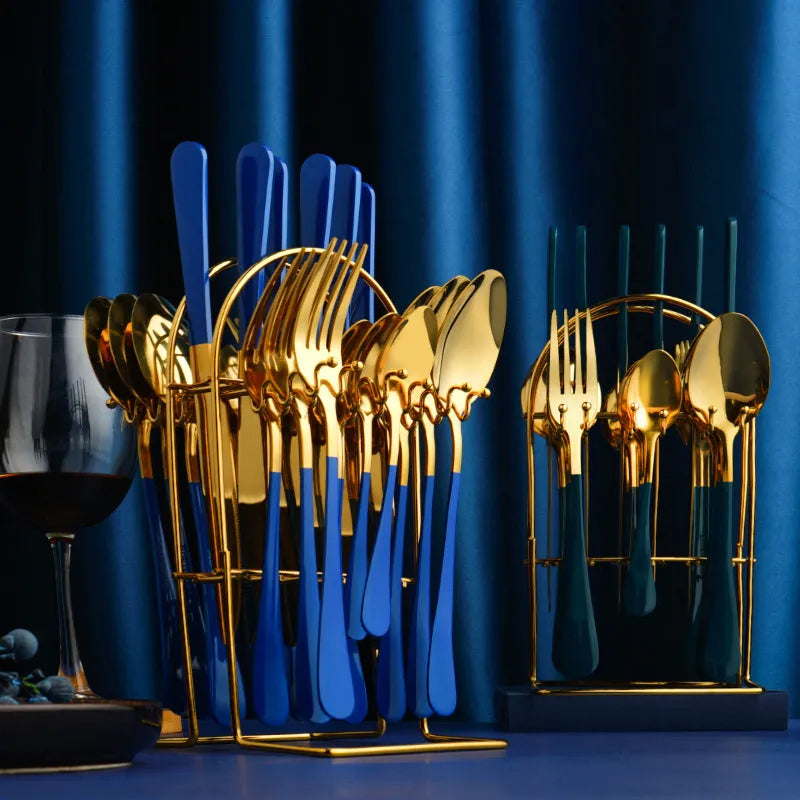 24-piece stainless steel cutlery set with storage rack in gold finish showing knives, forks, spoons