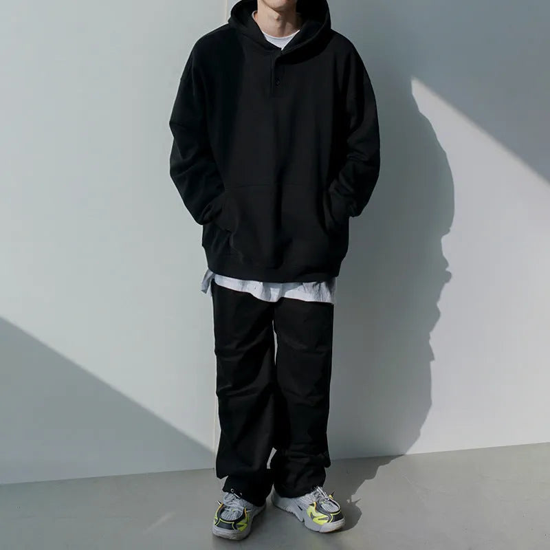 Men's hooded cotton sweatshirt black loose fit with button detail and hidden pocket