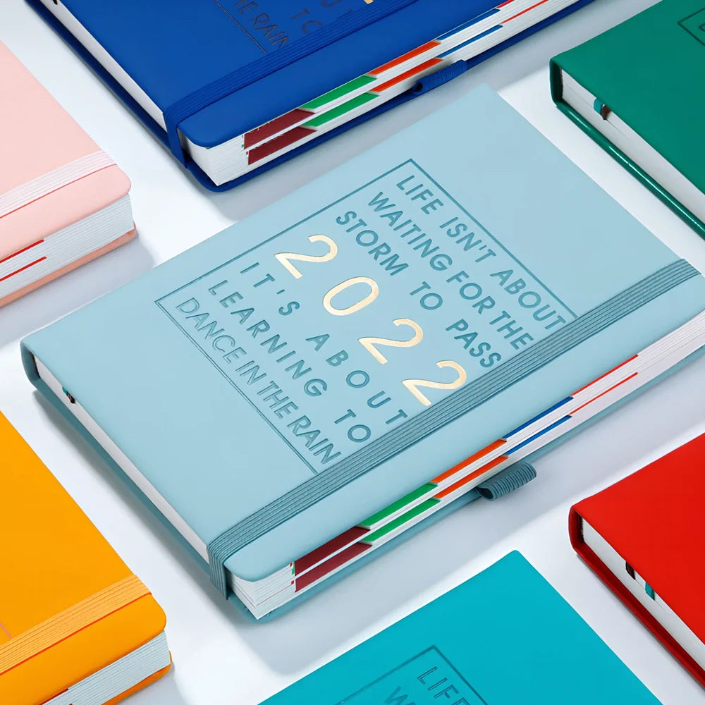 Red A5 imitation leather notebook with French fold binding and 100gsm pages, weighing 540g