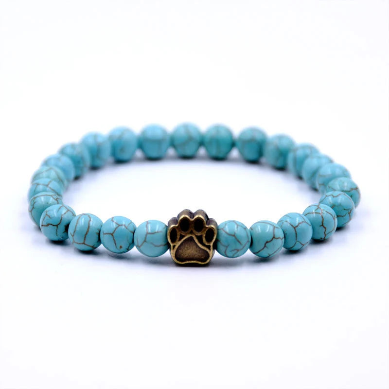 Natural stone dog paw bracelet featuring tiger eye and volcanic stone in a unisex design