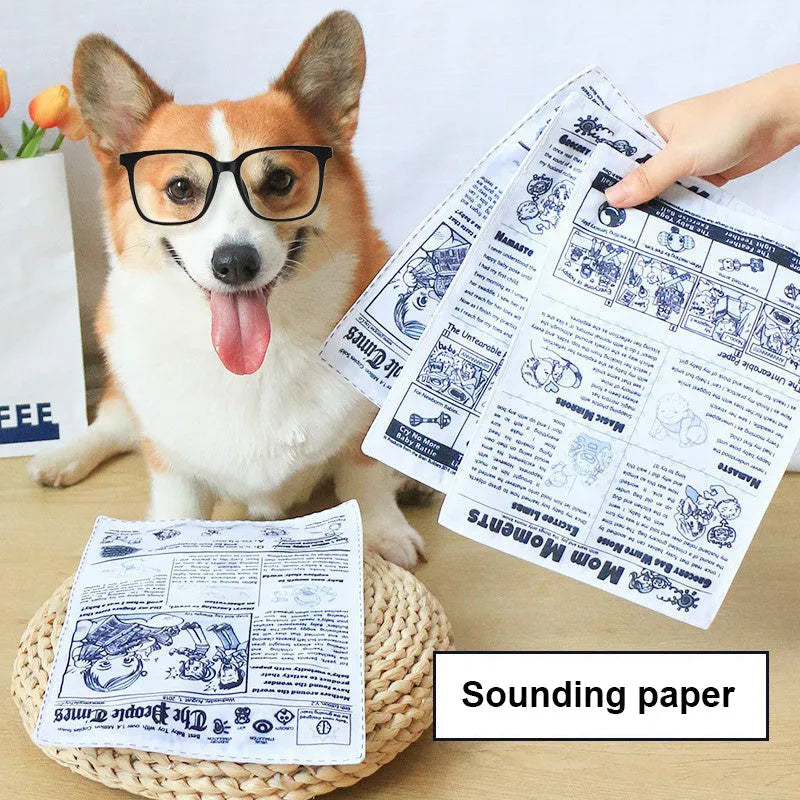 Tearproof pet dog toy with simulated squeaking newspaper playing cards for interactive play