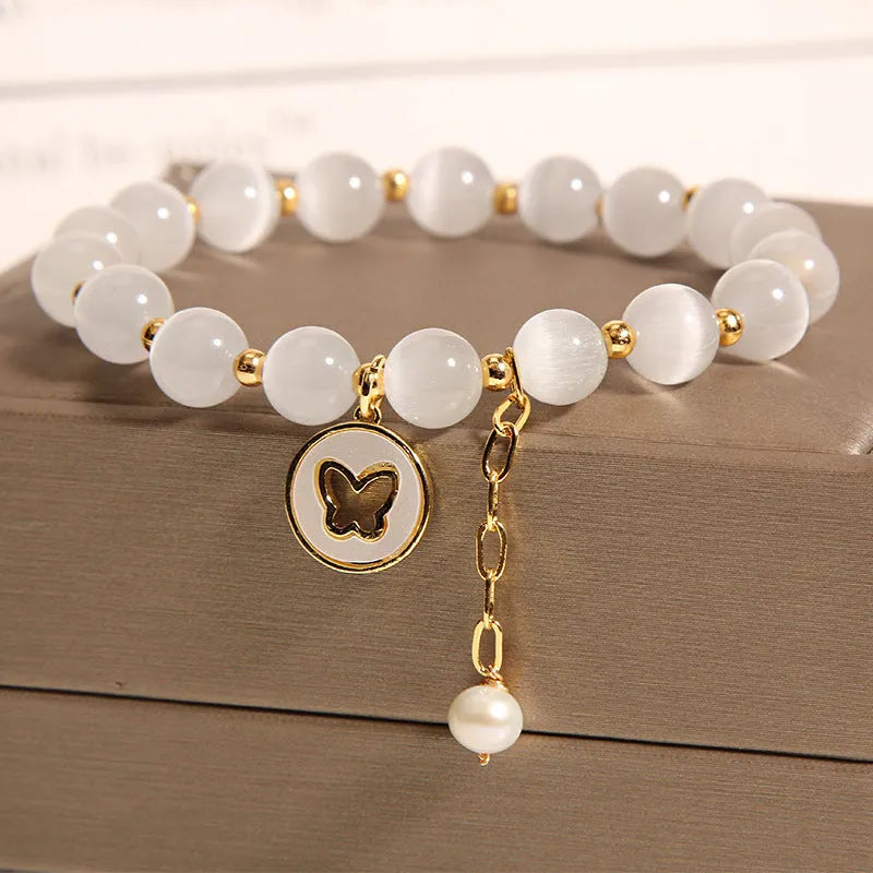 White cat's eye crystal bracelet with geometric design and Korean-style influences