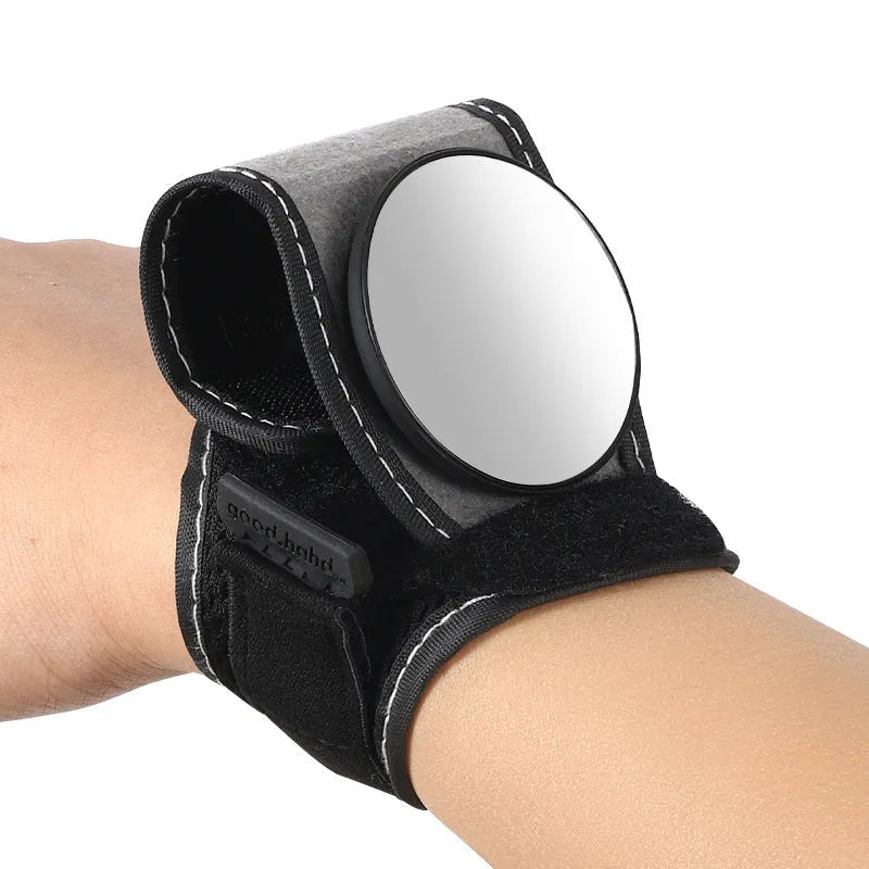 Black nylon bicycle rear-view mirror showing wrist mounting and adjustable viewing mechanism