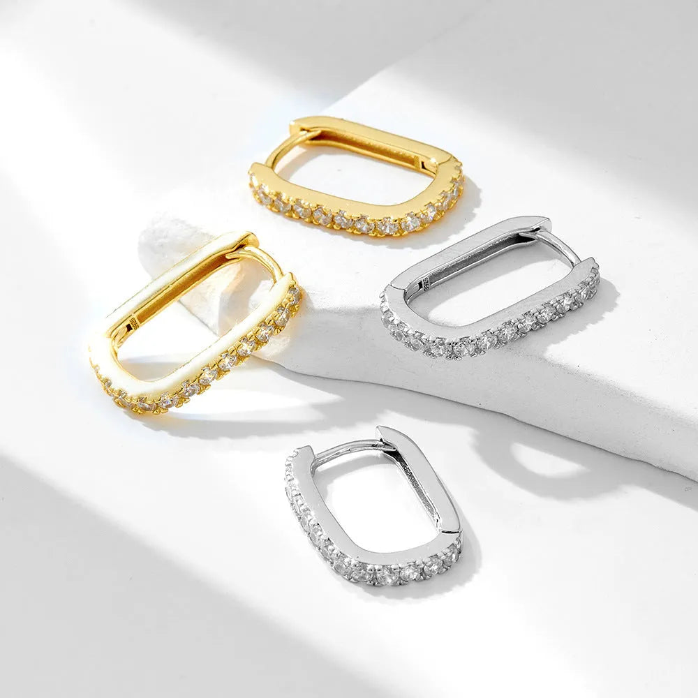 Sterling silver oval zircon ear clip earrings with gold plating options