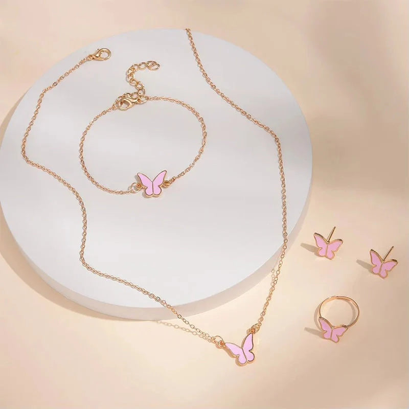5-piece butterfly pendant jewellery set for women, including necklace, earrings, ring, and bracelet in various colours