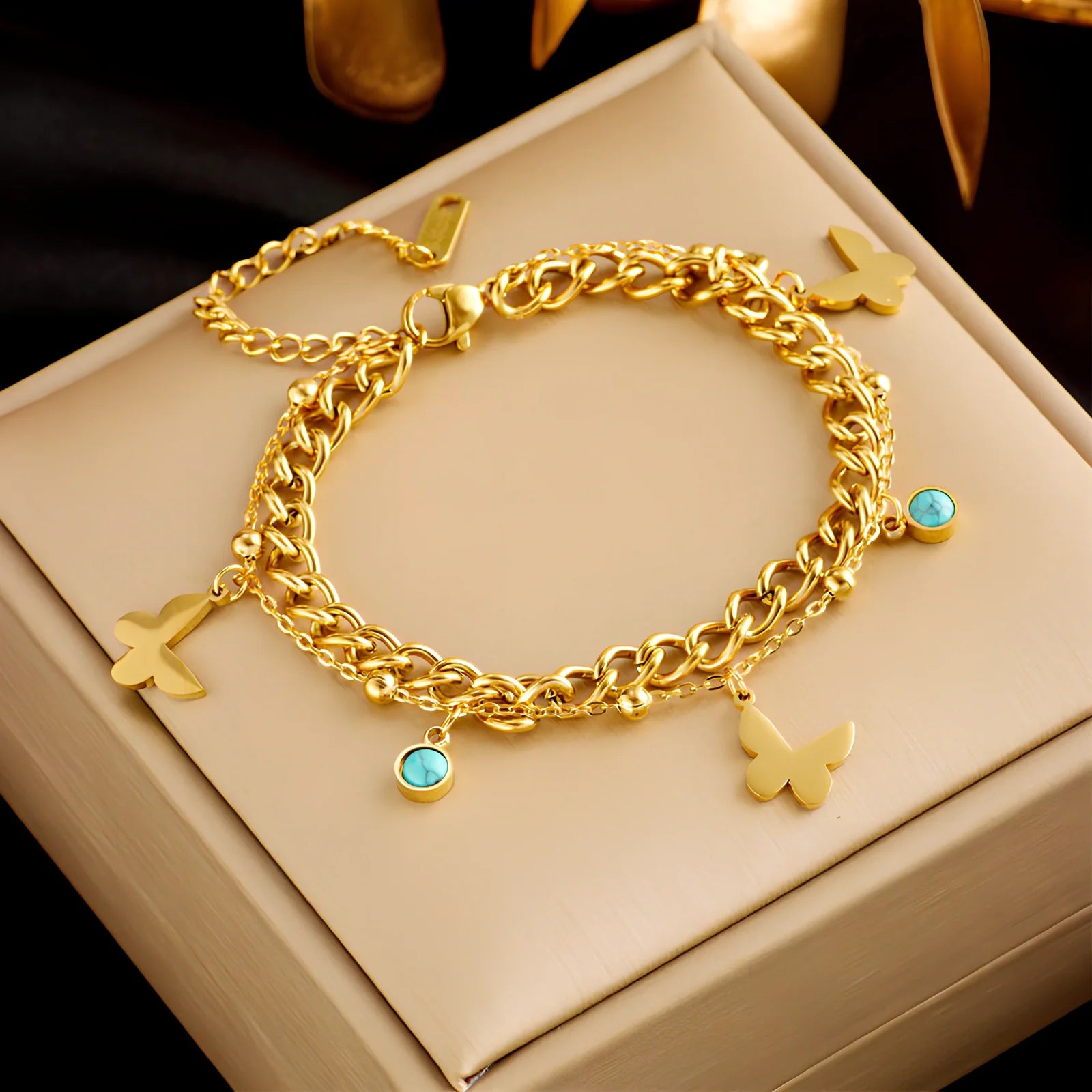 Gold plated titanium steel double-layer snake chain bracelet with five-pointed star charm