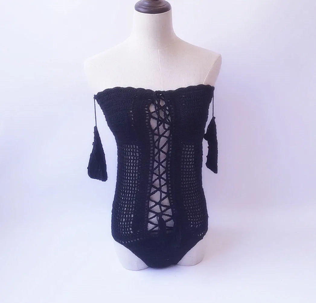 Off-shoulder one-piece swimsuit in European and American sizing on a model.