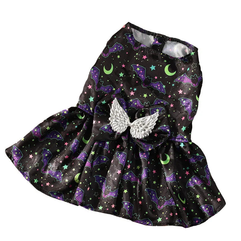 Orange Halloween dog costume with angel wings and a halo, featuring a bright pumpkin print design.