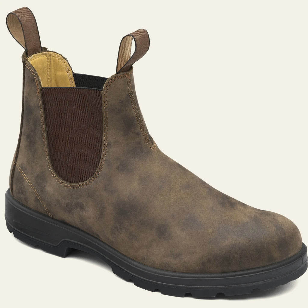A pair of vintage-style brown unisex Chelsea boots with a round toe and low horseshoe heel.