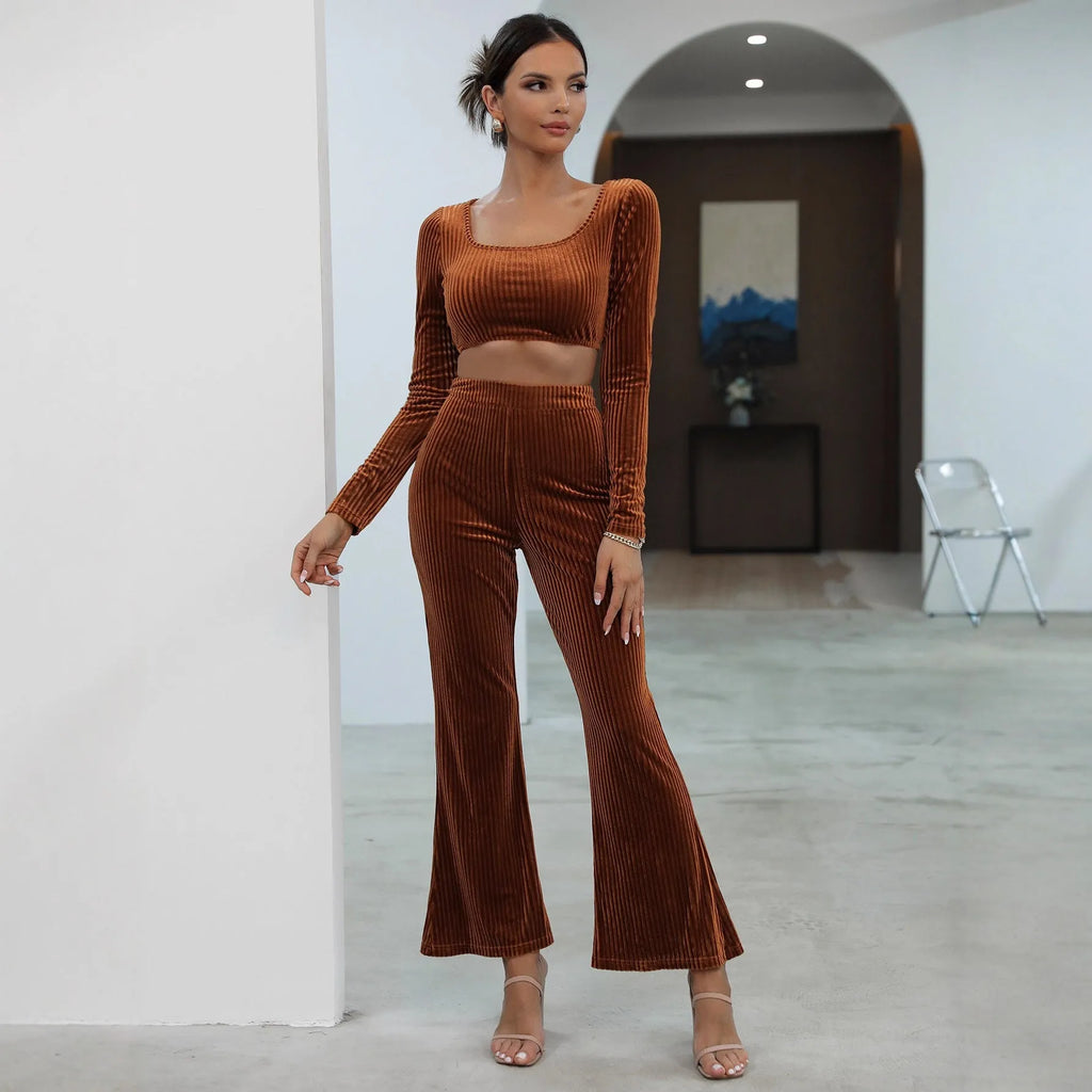 Caramel coloured long sleeve sweater and trouser casual set laid flat