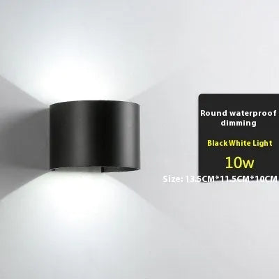 Modern black aluminium and glass wall lamp with silicone rubber detailing and integrated LED light.