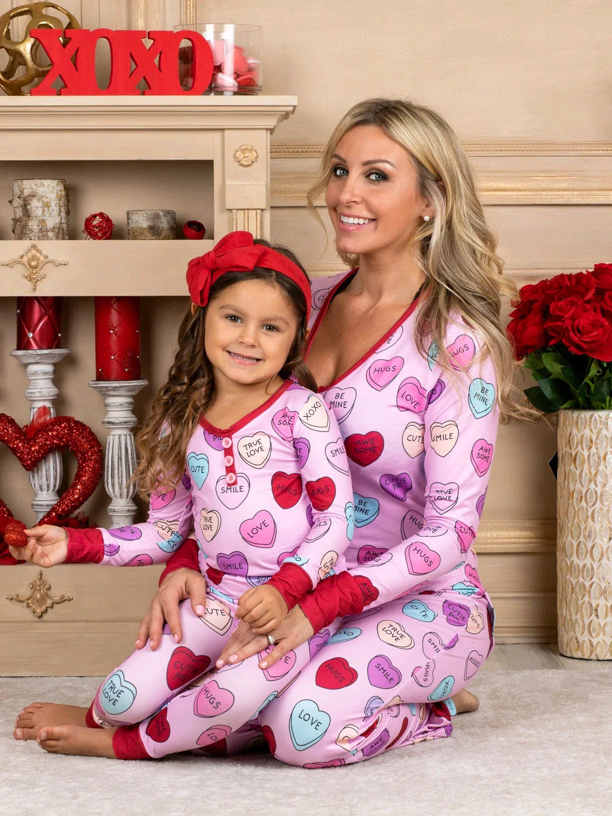 Valentines Day family pajamas with a cozy heart print design for parents and children