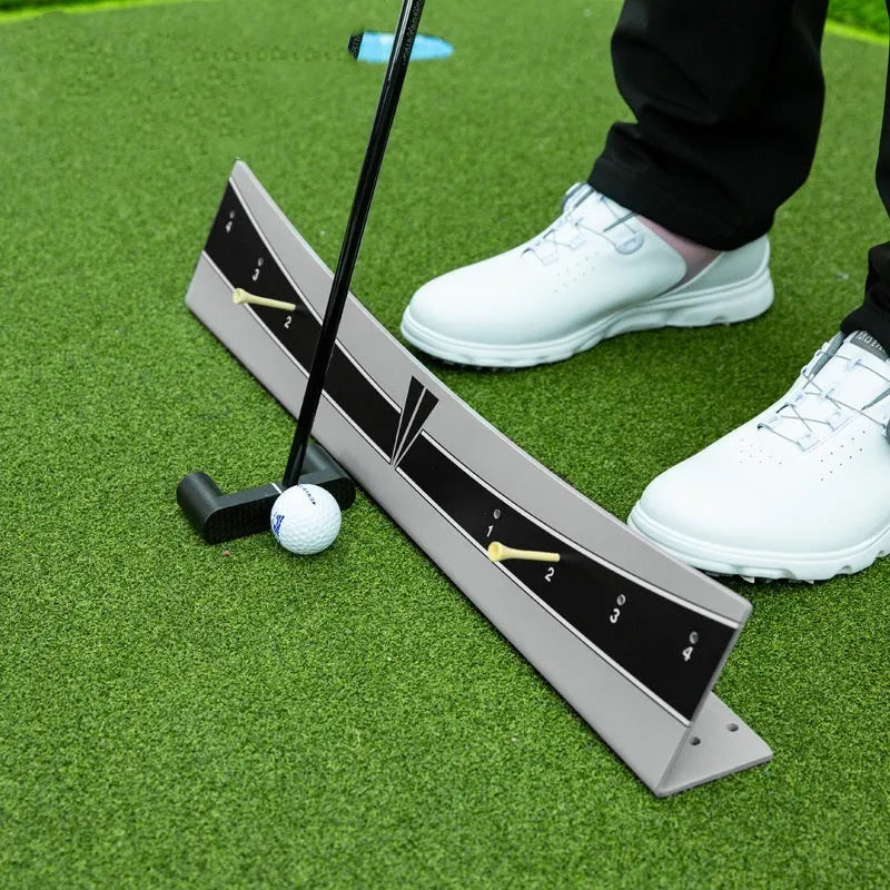 Adjustable golf putter trajectory balance simulator with PVC construction on a flat surface