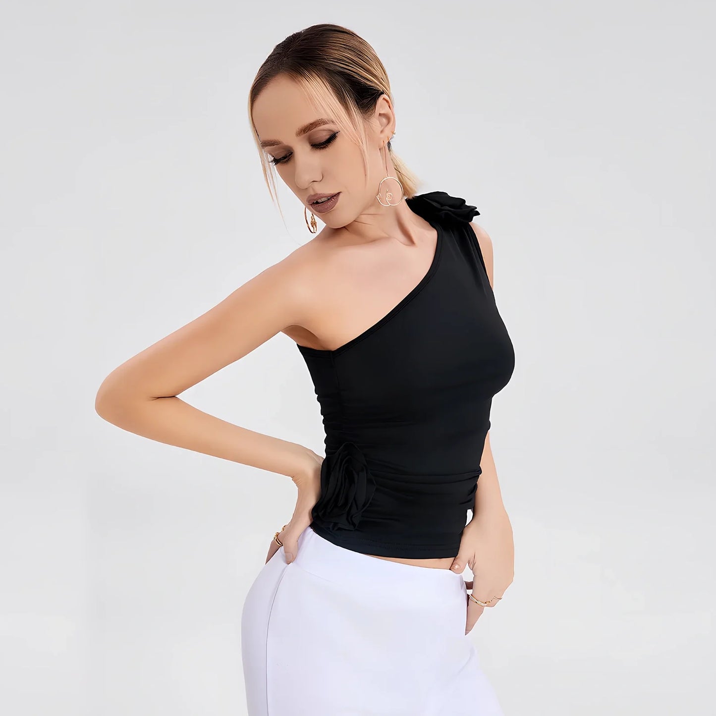 Black one-shoulder pleated flaperon vest top with three-dimensional rose detail, 25cm length size S, 95% polyester stretch fabric