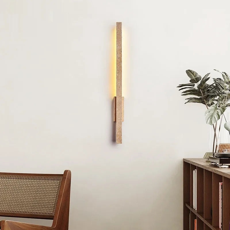 Minimalist strip wall lamp with warm light, cave stone base, black wood colour finish, 55cm length