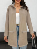 Grey loose fit mid-length women's cardigan coat with front pockets on a hanger.