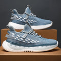 Men's mesh lace up running shoes in peacock blue with thick sole and round toe