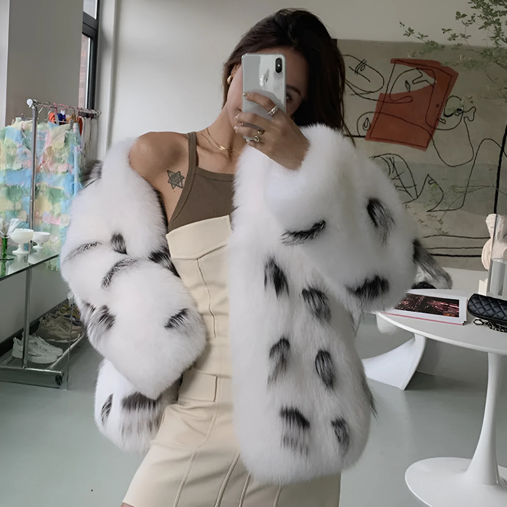 Black and white women's plus size short faux fur coat with a slim fit.
