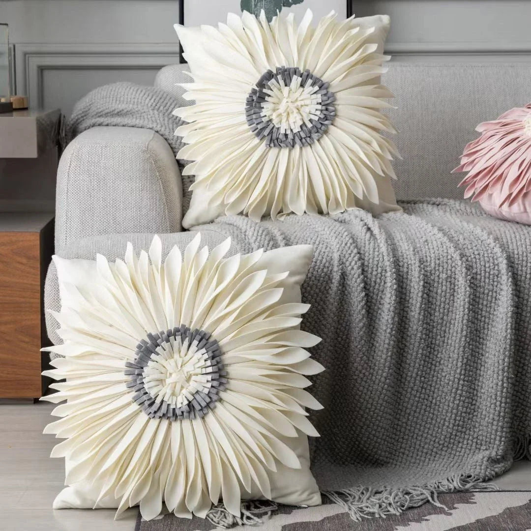 Luxurious velvet throw cushions with elegant 3D chrysanthemum embroidery, available in a range of sophisticated colours.