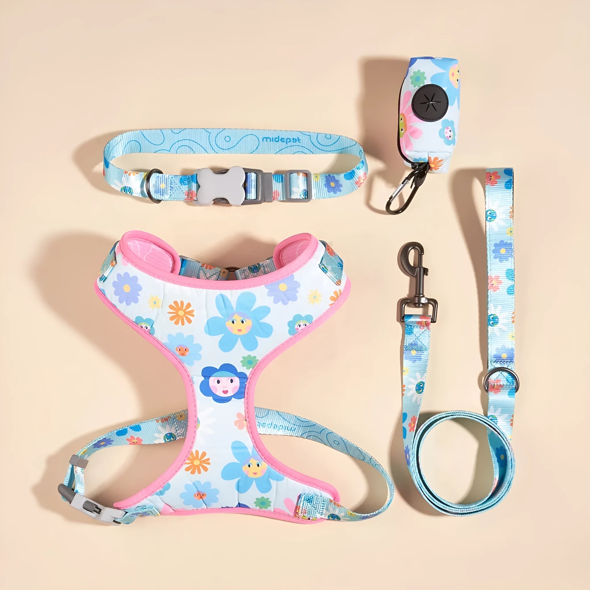 Pink sunflower four-piece pet rope set with collar, chest back, traction rope, and bin bag on display