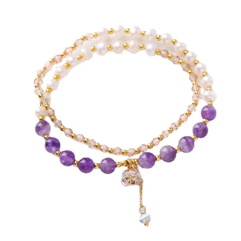 Women's double ring bracelet with crystal charms in choice of strawberry quartz, amethyst, or aquamarine colour.