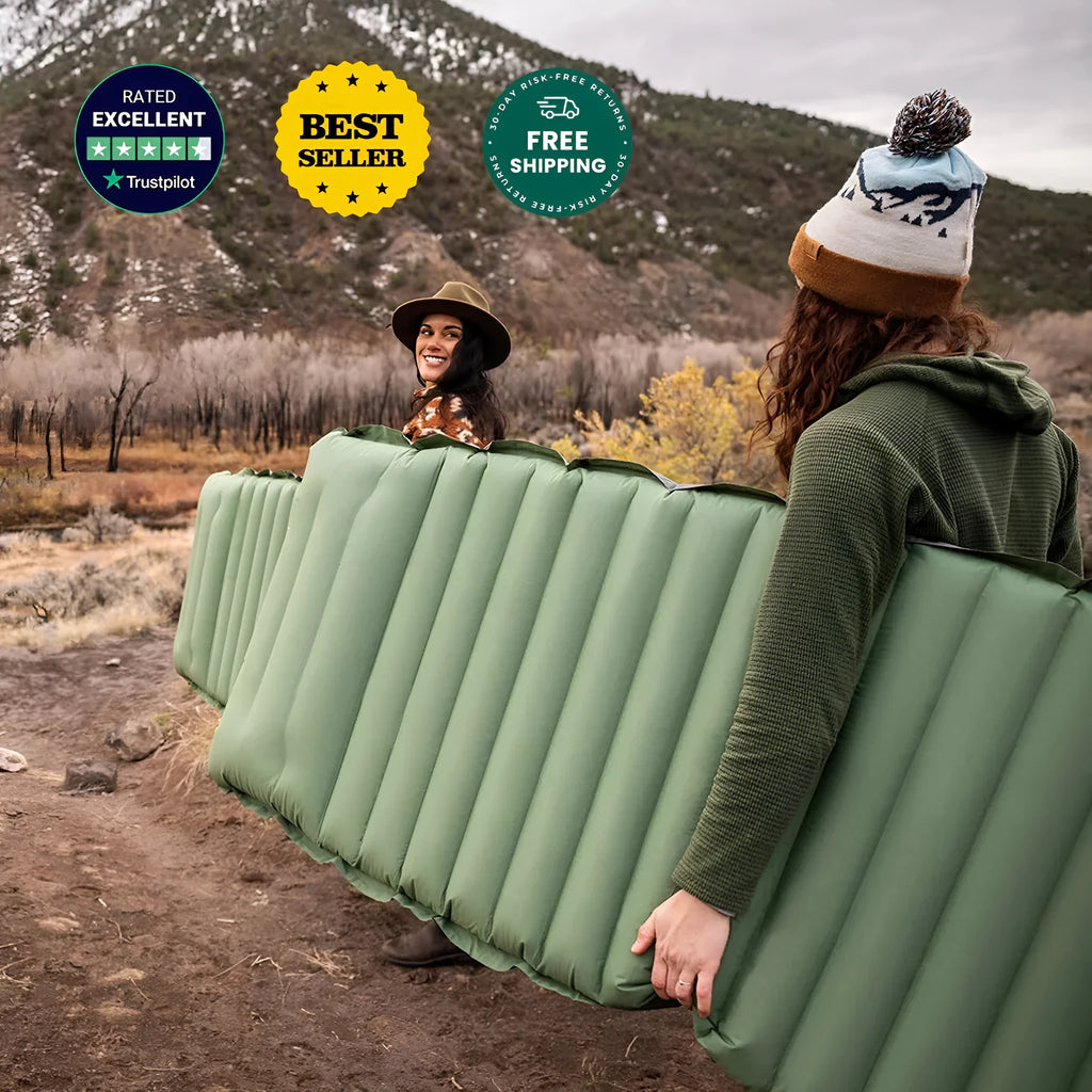 A portable inflatable camping mattress in desert grey colour, shown inflated to its 195x70cm size.