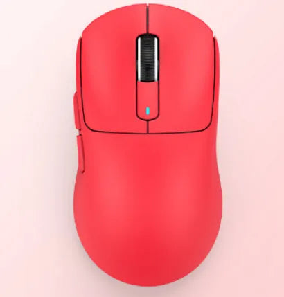 Black three-mode rechargeable computer mouse with USB receiver and coiled parachute cord on a wood desk.