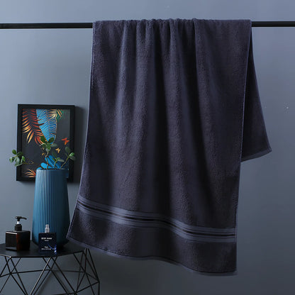 Three-piece cotton bath towel set in blue, featuring 70x150cm bath towel, 34x75cm hand towel, and 34x35cm square scarf for absorbent drying