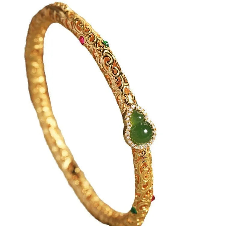 Gold-plated open xiangyun gourd charm bracelet on copper base for women